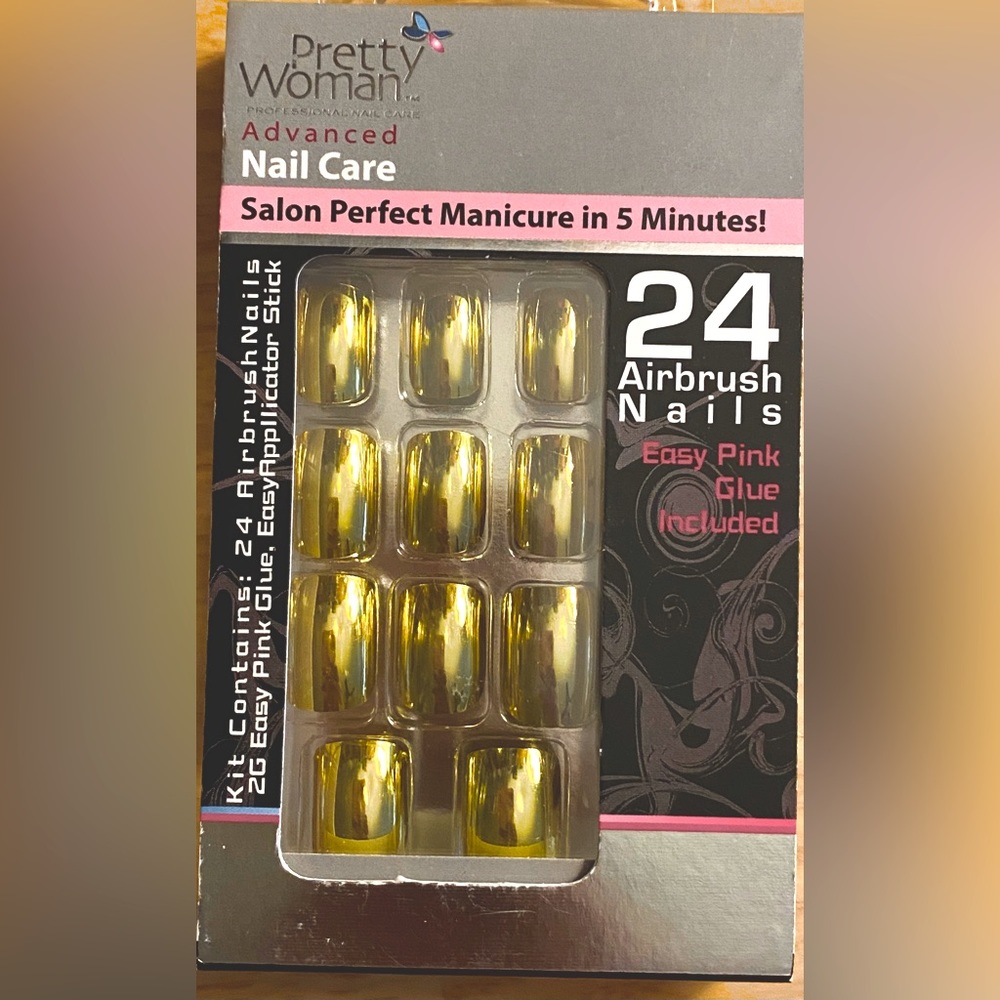 Gold press-on nails.